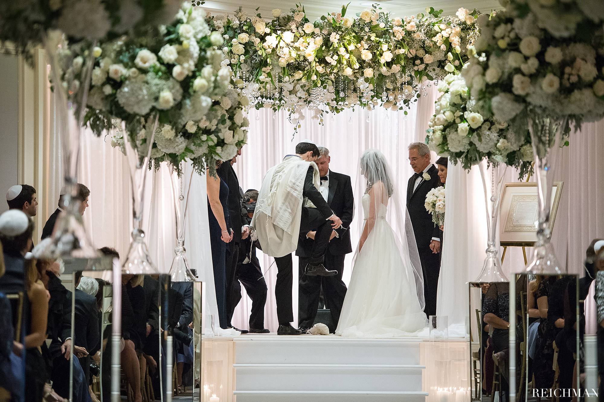 Groom stepping on glass Jewish wedding