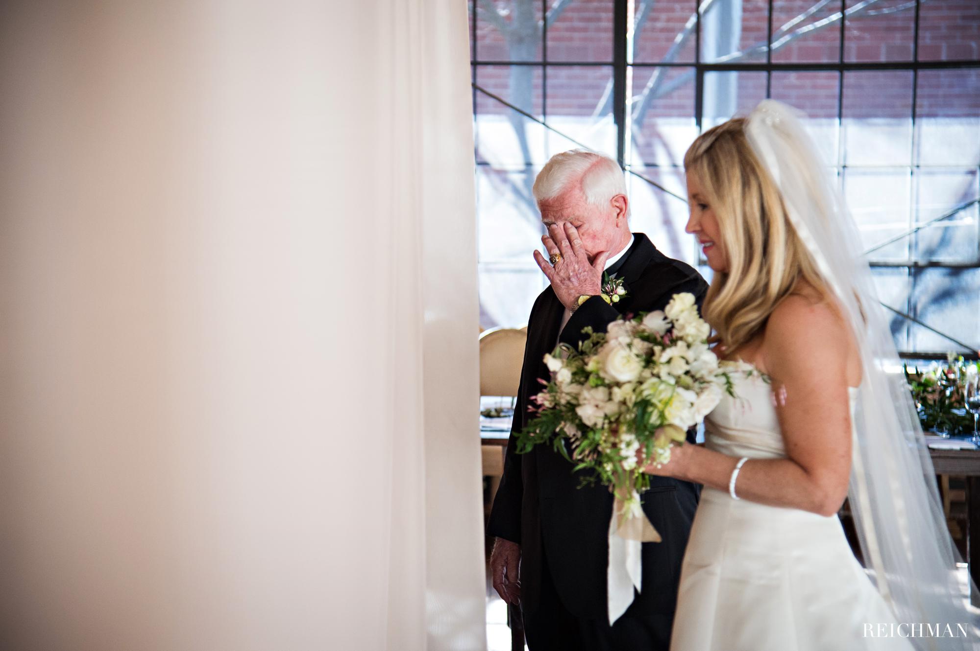 emotional father with bride
